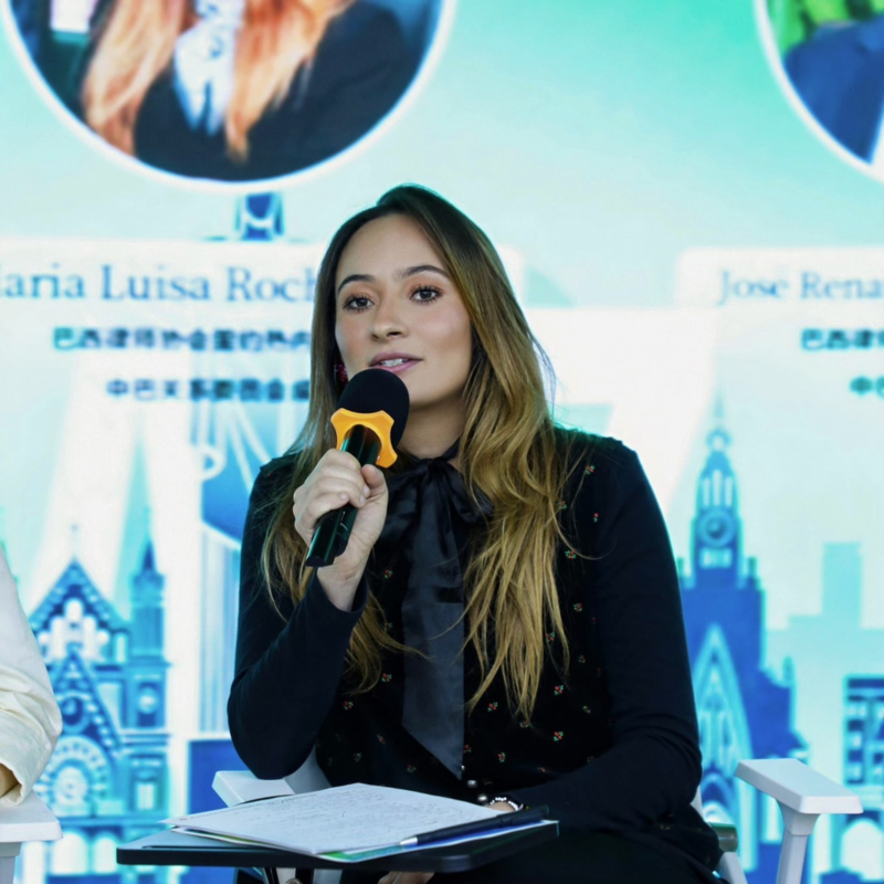 Maria Luisa Malta speaking at an event